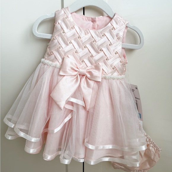 Elegant Pink Baby Dress with Bow - Picture 1 of 2